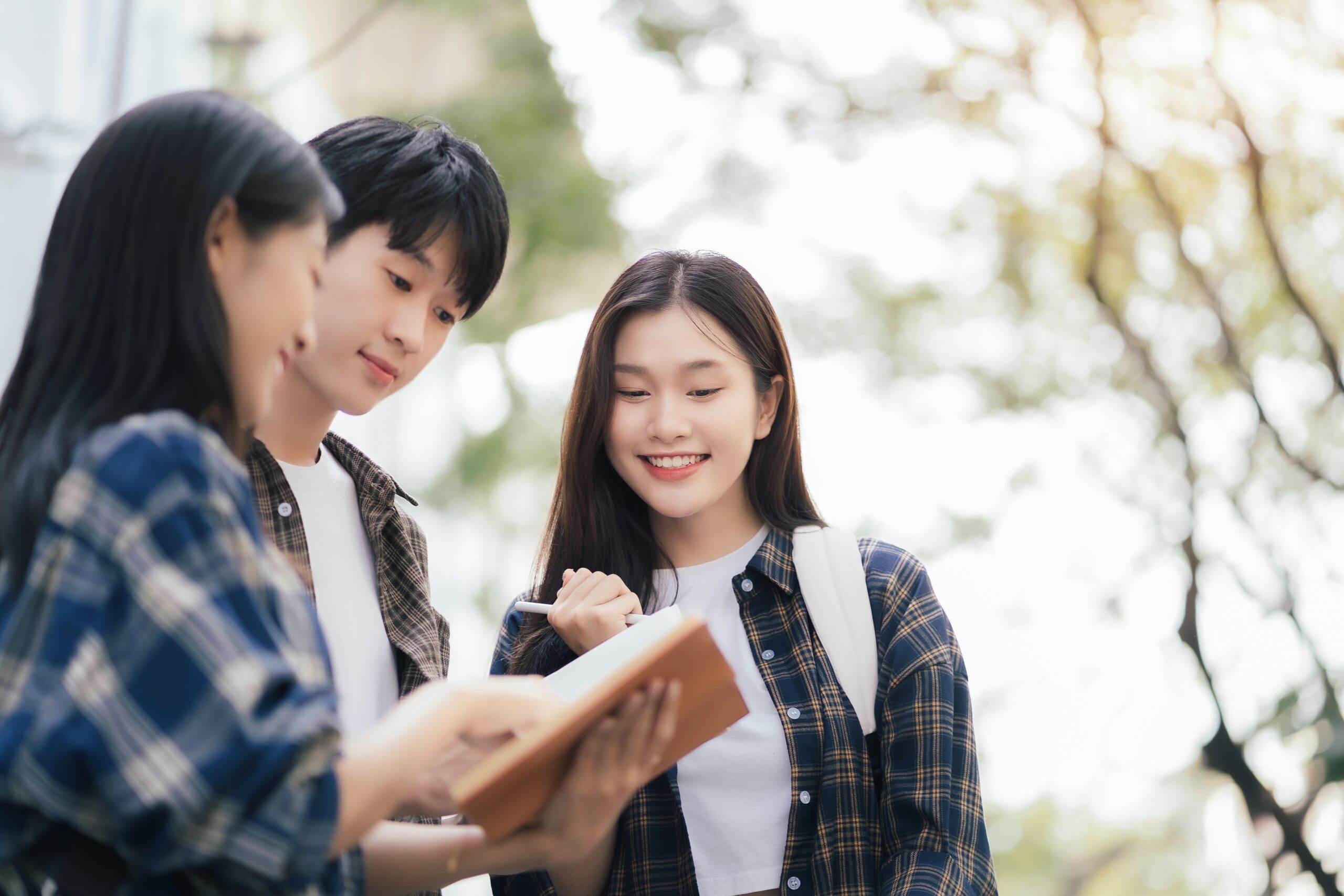 Students studying together during IELTS Preparation at a British Council Exam Centre in Thailand with Dragon Study Tours.