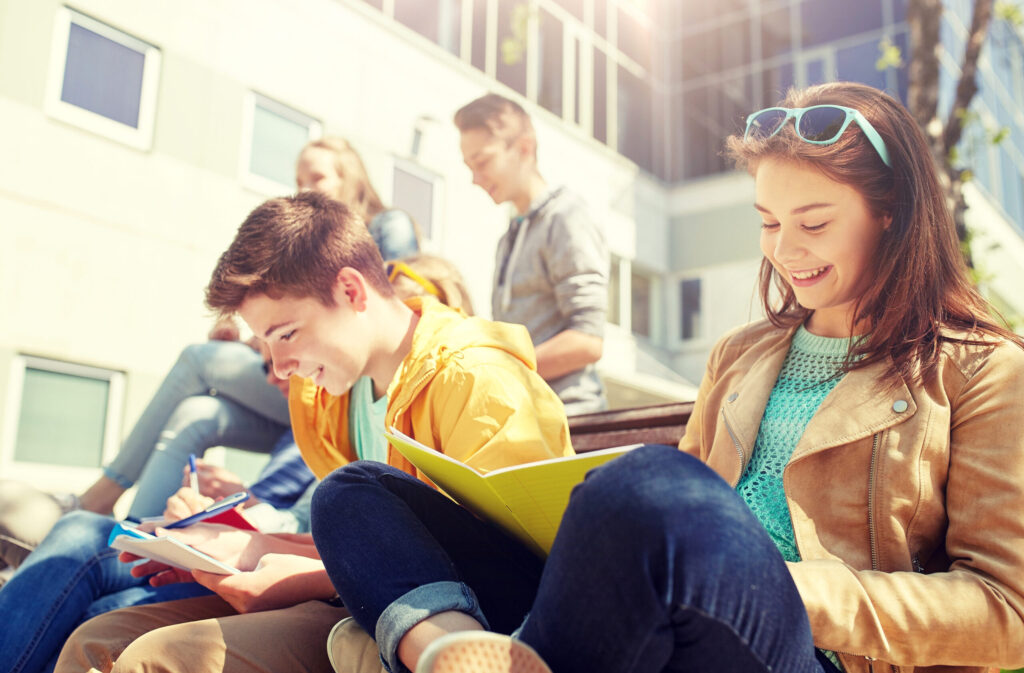 IELTS Preparation in Hua Hin students studying outdoors at The Palm Residence.