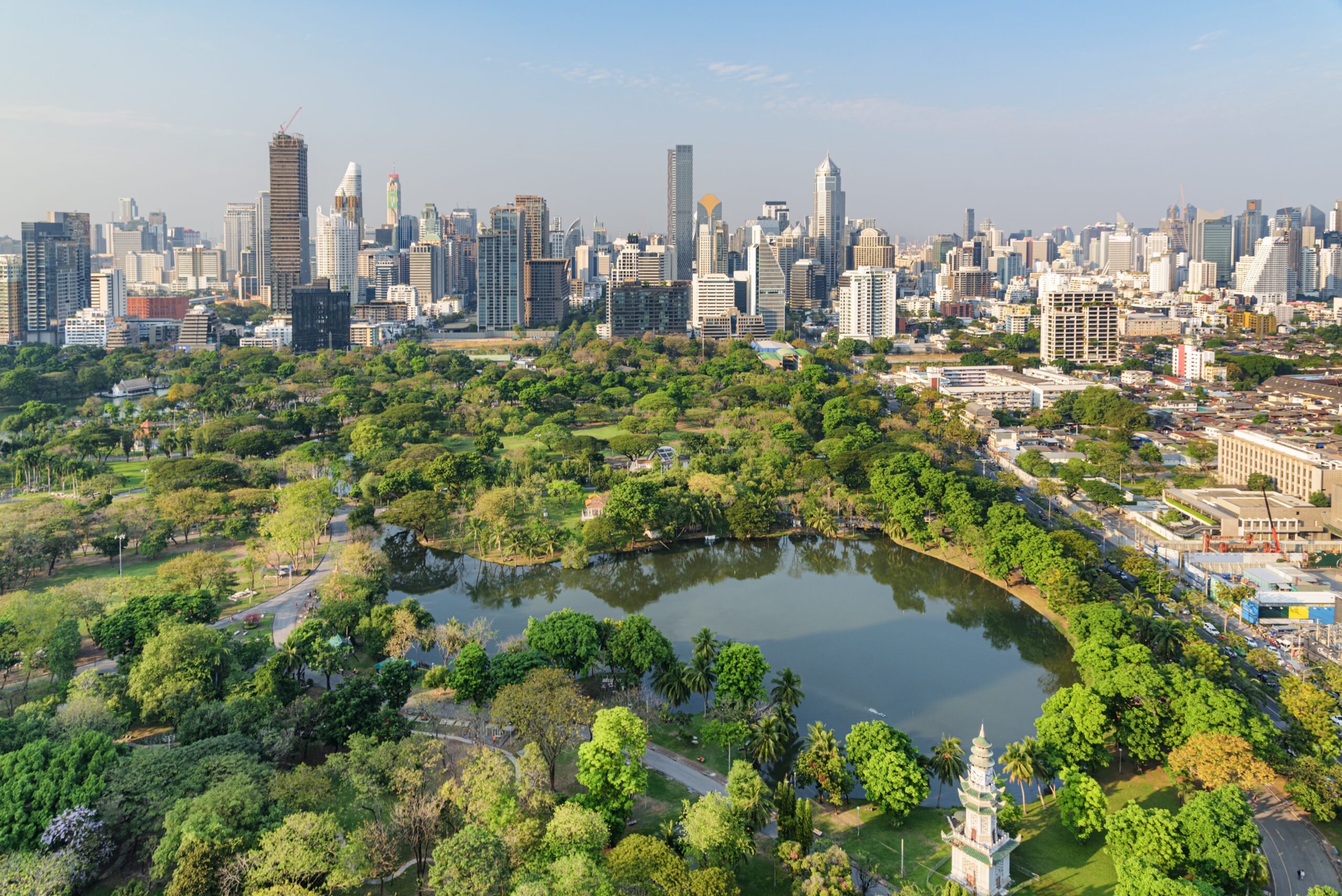 Explore Bangkok – Aerial view of Lumphini Park and Bangkok skyline