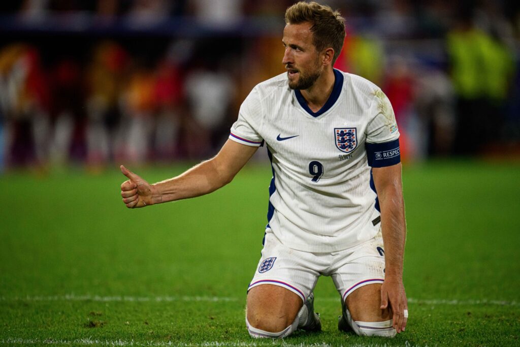 Football and English camp in Thailand students inspired by England captain showing leadership after scoring in World Cup qualifier.
