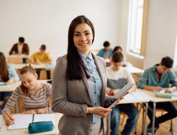 Learn English in Thailand - Academic Programme classroom with teacher guiding junior learners during English lessons